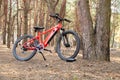 Ukraine Dnipro 05.04.2021 - a red electric bike is recharged in a forest in a park, new technologies