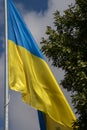 Ukraine flag waving on the wind against the blue sky Royalty Free Stock Photo