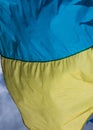 Ukraine flag waving on the wind against the blue sky Royalty Free Stock Photo