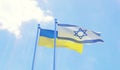 Ukraine and Israel, flags waving against blue sky Royalty Free Stock Photo