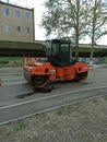 Ukraine, Izmail April 22, 2020: road repair in a modern city with a heavy vibratory skating rink.