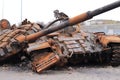 Ukraine, Kalynivka, Kyiv Oblast - 04.25.2022: Broken burnt tank. Destroyed military equipment.