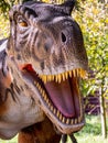 Ukraine, Khmelnitsky, October 2021. Dinosaur model in the park. Giant tyrannosaurus at an exhibition in the park on a summer sunny