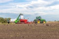 Ukraine, Khmelnytsky region, September 2021. Loading grain into the seeder in the field during the sowing of winter wheat.