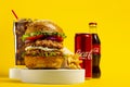 UKRAINE, KIEV - AUGUST 24, 2021: Big burger with chicken cutlet, fries and Coca-cola