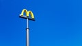 Ukraine, Kiev - August 23, 2019: McDonalds logo against the sky. McDonald`s Corporation is the world`s largest chain of hamburge Royalty Free Stock Photo