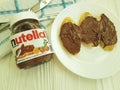 Ukraine Kiev10 March 2018 Nutella hazelnut chocolate on the wooden breakfast morning creamy