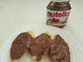 Ukraine Kiev10 March 2018 Nutella nougat ferrero nutrition delicious chocolate on the wooden tasty popular creamy lunchsandwich