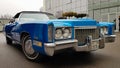 Ukraine, Kiev - March 27, 2020: vintage retro classic car Cadillac beatriz of blue color. emblem on the hood with a logo. original