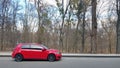 Ukraine, Kiev - March 27, 2020: Volkswagen Golf GTi TCR red in the forest Royalty Free Stock Photo