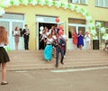Ukraine Kiev May 2019. Graduation class go to the line in the open school yard, at the last bell festival for parents