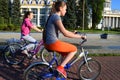 Ukraine, Kiev, May 11, 2015. Two teenage girls ride bicycles.