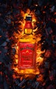 Ukraine, Kiev. November 12, 2020. Bottle of Jack Daniels Whiskey Tennessee Fire top view in burning coals