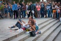 UKRAINE, KIEV - September 11,2013: Homeless couple watching a co