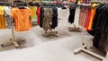 Ukraine, Kiev - September 04, 2019: A large clothing store, mannequins and many rows with hangers, a variety of sizes and colors.