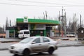 Ukraine, Kremenchug - March, 2019: Gas station WOG. Cars passing by in motion blur busy