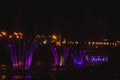 Ukraine. Kyiv - 05.06.2019 Amazing dancing fountain in the night illumination of rainbow color with colorful illuminations on the