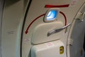 Ukraine, Kyiv - December 29, 2020: Airplane door from the inside. Handle to open the aircraft outward. A Boeing 737-75C passenger Royalty Free Stock Photo