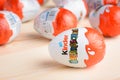 Ukraine, Kyiv - December 25, 2018: Kinder Surprise Egg on a wooden background Royalty Free Stock Photo