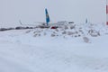 Ukraine, Kyiv - February 12, 2021: Planes at Winter. Aircraft. There is a lot of snow at the airport. Bad weather and visibility. Royalty Free Stock Photo