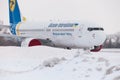 Ukraine, Kyiv - February 12, 2021: Planes at Winter. Aircraft. There is a lot of snow at the airport. Bad weather and visibility. Royalty Free Stock Photo