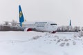 Ukraine, Kyiv - February 12, 2021: Planes at Winter. Aircraft. There is a lot of snow at the airport. Bad weather and visibility. Royalty Free Stock Photo