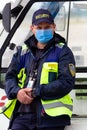 Ukraine, Kyiv - July 14, 2020: Airport employee wearing a medical mask. A man is a border guard of the security service of the