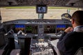 Ukraine, Kyiv - October 29, 2019: Airplane cockpit aircraft -Embraer. Plane instrument panel. Pilot seat. Night.