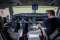 Ukraine, Kyiv - October 29, 2019: Airplane cockpit aircraft -Embraer. Plane instrument panel. Pilot seat. Night.