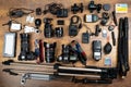 Ukraine, Kyiv - October 15, 2020: The contents of the bag and the photographer`s working tools - camera, flash, tripod, lenses. A