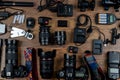 Ukraine, Kyiv - October 15, 2020: The contents of the bag and the photographer`s working tools - camera, flash, tripod, lenses. A