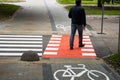 UKRAINE, LUTSK - May 10, 2020: Pedestrian walks on bike path.