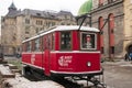 UKRAINE, LVIV - DECEMBER 27, 2016: Lviv red tram which is a touristic shop to buy different souvenirs, maps and postcards. red cof