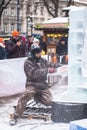 Ukraine, Lviv - January 11, 2019: Master makes ice sculptures from ice. Ice Sculpture Festival