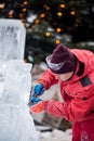 Ukraine, Lviv - January 11, 2019: Master makes ice sculptures from ice. Ice Sculpture Festival