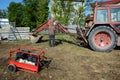 UKRAINE - MAY 06, 2017: The electric welder repairs the excavator by welding. Diesel generator for emergency electric power.