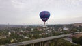 Ukraine October 3, 2020, Kamyanets Podolsk Balloon Festival, morning launch. Cloudiness Flying over the bridge to the