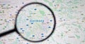 UKRAINE, ODESSA - APRIL 25, 2019: Germany on google maps through magnifying glass. Royalty Free Stock Photo