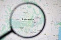 UKRAINE, ODESSA - APRIL 25, 2019: Romania on google maps through magnifying glass.