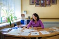 Ukraine, Odessa. August 2, 2017. Woman in the office at the table. Secretary. Medical worker