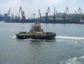 Ukraine, Odessa, Commercial Sea Port, June 01, 2012. Port Fire-Fighting Boat Patriot Russian Circulates in The Port Water Area