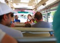 Ukraine Odessa July 2018. A guide on a tourist bus conducts an interesting tour, tourists listen very carefully. Tourism concept.