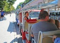 Ukraine Odessa July 2018. A guide on a tourist bus conducts an interesting tour, tourists listen very carefully. Tourism concept.