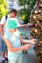 Ukraine Odessa July 2018. Tourists on excursions. Sculpture in the form of a big heart in Odessa. Locks of lovers