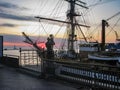 Ukraine, Odessa, Maritime Passenger Complex, August 23, 2009. Sunrise, Sailor Figure and Moored On The 16th Mooring Ã¢â¬ÅAmerigo