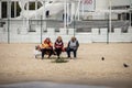 Ukraine, Odessa, October 17, 2019: Three elderly women rest on a bench near the sea Royalty Free Stock Photo