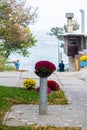 Ukraine, Odessa, October 17, 2019: Vase with flowers on a pedestal at the beginning of the descent to the beach to the sea Royalty Free Stock Photo