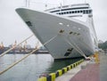 Ukraine, Odessa, Commercial Sea Port, November 25, 2012. Ocean Cruise Liner MSC LIRICA Is Pinned by Tense Mooring Ropes to The