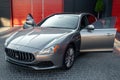 Ukraine, Odessa - September 8, 2021: Maserati Ghibli sport car parked near the garage with open doors Royalty Free Stock Photo