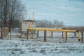 Ukraine, old ancient classical Soviet oil pumps at winter